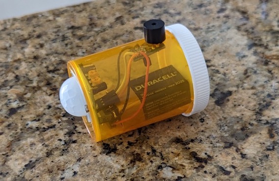 The finished device simply buzzes when motion is detected.